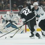 
              Los Angeles Kings center Andreas Athanasiou (22) shoots against San Jose Sharks goaltender Zach Sawchenko (36) during the first period of an NHL hockey game Thursday, March 10, 2022, in Los Angeles. (AP Photo/Ashley Landis)
            