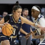 
              Mount St. Mary's Kendall Bresee (3) handles the ball as Longwood's Akila Smith (13) defends during the first half of an NCAA college basketball game in Raleigh, N.C., Thursday, March 17, 2022. (AP Photo/Ben McKeown)
            