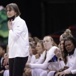 
              Stanford head coach Tara VanDerveer washes from the bench during the first half of a college basketball game against Maryland in the Sweet 16 round of the NCAA tournament, Friday, March 25, 2022, in Spokane, Wash. (AP Photo/Young Kwak)
            