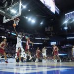 
              Duke forward AJ Griffin, second from left, shoots against Arkansas during the second half of a college basketball game in the Elite 8 round of the NCAA men's tournament in San Francisco, Saturday, March 26, 2022. (AP Photo/Tony Avelar)
            