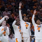 
              Tennessee players celebrate on the bench during the second half of a college basketball game against Longwood in the first round of the NCAA tournament in Indianapolis, Thursday, March 17, 2022. (AP Photo/Michael Conroy)
            