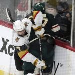 
              Vegas Golden Knights' Alex Pietrangelo (7) tries to get past Minnesota Wild's Kirill Kaprizov (97) as he pursues the puck in the second period of an NHL hockey game, Monday, March 21, 2022, in St. Paul, Minn. (AP Photo/Jim Mone)
            