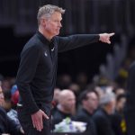 
              Golden State Warriors coach Steve Kerr gestures during the first half of the team's NBA basketball game against the Atlanta Hawks on Friday, March 25, 2022, in Atlanta. (AP Photo/Hakim Wright Sr.)
            