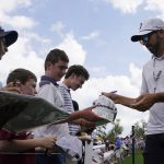 
              Sergio Garcia of Spain signs autographs during a practice round at The Players Championship golf Tournament, Wednesday, March 9, 2022, in Ponte Vedra Beach, Fla. (AP Photo/Lynne Sladky)
            