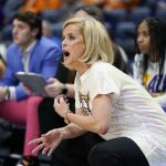 
              LSU head coach Kim Mulkey watches the action in the first half of an NCAA college basketball game against Kentucky at the women's Southeastern Conference tournament Friday, March 4, 2022, in Nashville, Tenn. (AP Photo/Mark Humphrey)
            