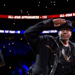 
              FILE - Former Philadelphia 76er Allen Iverson salutes the crowd during a retirement ceremony at halftime of an NBA basketball game between the 76ers and the Washington Wizards, March 1, 2014, in Philadelphia. (AP Photo/Matt Slocum, File)
            