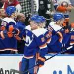 
              New York Islanders' Brock Nelson (29) celebrates with teammates after scoring a goal during the first period of an NHL hockey game Sunday, March 27, 2022, in Elmont, N.Y. (AP Photo/Frank Franklin II)
            