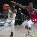 
              UAB guard Jordan Walker (10) is defended by Louisiana Tech guard Cobe Williams (24) during the first half of an NCAA college basketball game for the championship of the Conference USA men's tournament in Frisco, Texas, Saturday, March 12, 2022. UAB won 82-73. (AP Photo/LM Otero)
            