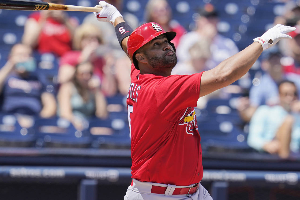 St. Louis Cardinals' Albert Pujols (5) watches a foul ball as he bats in the first inning of a spri...
