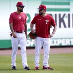 
              Philadelphia Phillies outfielders Nick Castellanos, left, and Kyle Schwarber, right, do drills before a spring training baseball game against the Toronto Blue Jays, Wednesday, March 23, 2022, in Clearwater, Fla. Castellanos and the Phillies finalized a $100 million, five-year contract on Tuesday. (AP Photo/Lynne Sladky)
            