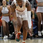 
              Miami's Kameron McGusty reacts after making a three-point basket during the second half of a college basketball game in the Sweet 16 round of the NCAA tournament Friday, March 25, 2022, in Chicago. (AP Photo/Charles Rex Arbogast)
            