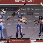 
              France's Tessa Worley, center, winner of an alpine ski, women's World Cup giant slalom, celebrates on the podium with second-placed Italy's Federica Brignone, left, and third-placed Sweden's Sara Hector, in Lenzerheide, Switzerland, Sunday, March 6, 2022. (AP Photo/Giovanni Auletta)
            