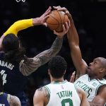 
              Boston Celtics center Al Horford, right, blocks a shot by Memphis Grizzlies center Steven Adams (4) during the second half of an NBA basketball game, Thursday, March 3, 2022 in Boston. The Celtics defeated the Grizzlies 120-107. (AP Photo/Charles Krupa)
            