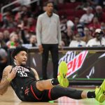 
              Houston Rockets center Christian Wood (35) watches his 3-point basket during the second half of an NBA basketball game against the Washington Wizards, Monday, March 21, 2022, in Houston. (AP Photo/Eric Christian Smith)
            