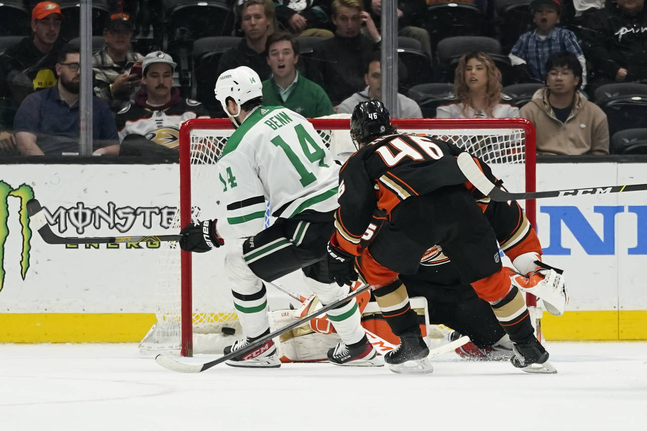 Dallas Stars left wing Jamie Benn (14) scores during overtime of an NHL hockey game against the Ana...