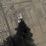 
              This satellite photo from Planet Labs PBC shows a fire still burning at Saudi Aramco's North Jiddah Bulk Plant after an attack by Yemen's Houthi rebels ahead of a Formula One race in Jiddah, Saudi Arabia, Saturday, March 26, 2022. Authorities pledged Saturday that the F1 race would go on Sunday. (Planet Labs PBC via AP)
            