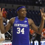 
              Kentucky forward Oscar Tshiebwe (34) celebrates after an NCAA college basketball game against Florida, Saturday, March 5, 2022, in Gainesville, Fla. (AP Photo/Matt Stamey)
            