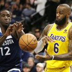 
              Los Angeles Lakers forward LeBron James (6) and Minnesota Timberwolves forward Taurean Prince (12) try to get control of a rebound during the second half of an NBA basketball game Wednesday, March 16, 2022, in Minneapolis. (AP Photo/Andy Clayton-King)
            
