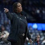 
              Auburn head coach Johnnie Harris directs her players in the second half of an NCAA college basketball game against Alabama at the women's Southeastern Conference tournament Wednesday, March 2, 2022, in Nashville, Tenn. (AP Photo/Mark Humphrey)
            