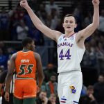 
              Kansas' Mitch Lightfoot reacts during the second half of a college basketball game in the Elite 8 round of the NCAA tournament Sunday, March 27, 2022, in Chicago. (AP Photo/Nam Y. Huh)
            
