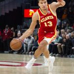 
              Atlanta Hawks guard Bogdan Bogdanovic (13) drives to the basket during the first half of an NBA basketball game against the Indiana Pacers, Sunday, March 13, 2022, in Atlanta. (AP Photo/Hakim Wright Sr.)
            