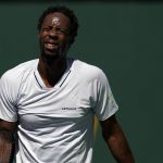 
              Gael Monfils, of France, reacts after serving to Daniil Medvedev, of Russia, at the BNP Paribas Open tennis tournament Monday, March 14, 2022, in Indian Wells, Calif. (AP Photo/Marcio Jose Sanchez)
            
