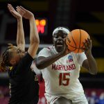 
              Maryland guard Ashley Owusu (15) drives against Delaware guard Paris McBride during the second half of a college basketball game in the first round of the NCAA tournament, Friday, March 18, 2022, in College Park, Md. Maryland won 102-71. (AP Photo/Julio Cortez)
            