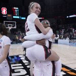 
              Stanford guard Lexie Hull (12) and forward Francesca Belibi, right, react after a college basketball game against Maryland in the Sweet 16 round of the NCAA tournament, Friday, March 25, 2022, in Spokane, Wash. Stanford won 72-66. (AP Photo/Ted S. Warren)
            