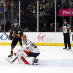 
              Vegas Golden Knights right wing Evgenii Dadonov (63) scores past Florida Panthers goaltender Spencer Knight (30) during the second period of an NHL hockey game Thursday, March 17, 2022, in Las Vegas. Panthers defenseman Aaron Ekblad is at left. (AP Photo/Steve Marcus)
            