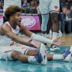 
              New York Knicks guard Miles McBride (2) questions an official during the first half of the team's NBA basketball game against the Charlotte Hornets on Wednesday, March 23, 2022, in Charlotte, N.C. (AP Photo/Rusty Jones)
            