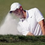 
              Rory McIlroy, of Northern Ireland, hits from a bunker on the ninth hole during the second round of the Arnold Palmer Invitational golf tournament Friday, March 4, 2022, in Orlando, Fla. (AP Photo/John Raoux)
            