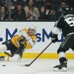 
              Nashville Predators left wing Tanner Jeannot (84) passes against Los Angeles Kings defenseman Jordan Spence (53) during the first period of an NHL hockey game Tuesday, March 22, 2022, in Los Angeles. (AP Photo/Ashley Landis)
            