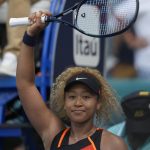 
              Naomi Osaka of Japan gestures after winning her second round women's match against Angelique Kerber of Germany at the Miami Open tennis tournament, Thursday, March 24, 2022, in Miami Gardens, Fla. (AP Photo/Rebecca Blackwell)
            