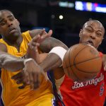 
              FILE - Los Angeles Lakers forward Antawn Jamison, left, and Los Angeles Clippers forward Caron Butler battle for a loose ball during the first half of their NBA basketball game, Feb. 14, 2013, in Los Angeles. (AP Photo/Mark J. Terrill, File)
            
