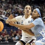 
              South Carolina guard Brea Beal, left, defends against North Carolina guard Kennedy Todd-Williams (3) during the first half of a college basketball game in the Sweet 16 round of the NCAA tournament in in Greensboro, N.C., Friday, March 25, 2022. (AP Photo/Gerry Broome)
            