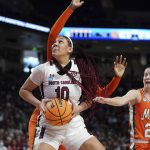 
              South Carolina center Kamilla Cardoso (10) drives to the hoop during the first half a second-round game against Miami in the NCAA college basketball tournament, Sunday, March 20, 2022, in Columbia, S.C. (AP Photo/Sean Rayford)
            