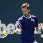 
              Daniil Medvedev of Russia returns a shot from Pedro Martinez of Spain, during the Miami Open tennis tournament, Monday, March 28, 2022, in Miami Gardens, Fla. (AP Photo/Wilfredo Lee)
            