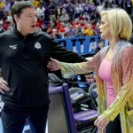
              Ohio State head coach Kevin McGuff, left, greets LSU head coach Kim Mulkey before the start of a college basketball game in the second round of the NCAA tournament, Monday, March 21, 2022, in Baton Rouge, La. (AP Photo/Matthew Hinton)
            