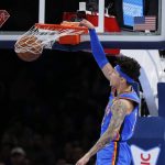 
              Oklahoma City Thunder forward Lindy Waters III dunks during the first half of the team's NBA basketball game against the Atlanta Hawks on Wednesday, March 30, 2022, in Oklahoma City. (AP Photo/Nate Billings)
            