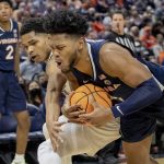
              Virginia forward Jayden Gardner (1) holds the ball during the second half of an NCAA college basketball game against Mississippi State in the first round of the NIT, Wednesday, March 16, 2022, in Charlottesville, Va. (Erin Edgerton/The Daily Progress via AP)
            