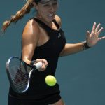 
              Jessica Pegula of the U.S. returns a ball in her quarterfinal match against Paula Badosa of Spain, at the Miami Open tennis tournament, Wednesday, March 30, 2022, in Miami Gardens, Fla. (AP Photo/Rebecca Blackwell)
            