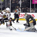 
              Chicago Blackhawks right wing Patrick Kane (88) shoots on Vegas Golden Knights goaltender Logan Thompson (36) during the first period of an NHL hockey game Saturday, March 26, 2022, in Las Vegas. (AP Photo/David Becker)
            