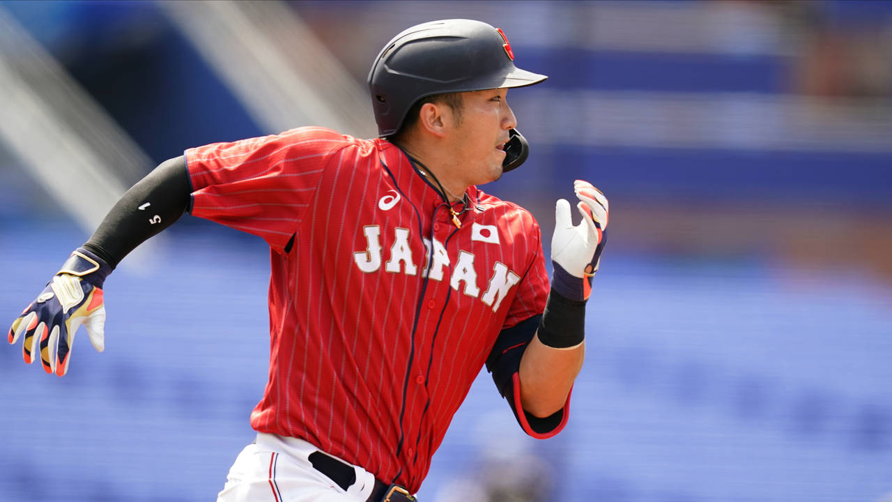 FILE - Japan's Seiya Suzuki plays during a baseball game at Yokohama Baseball Stadium during the 20...