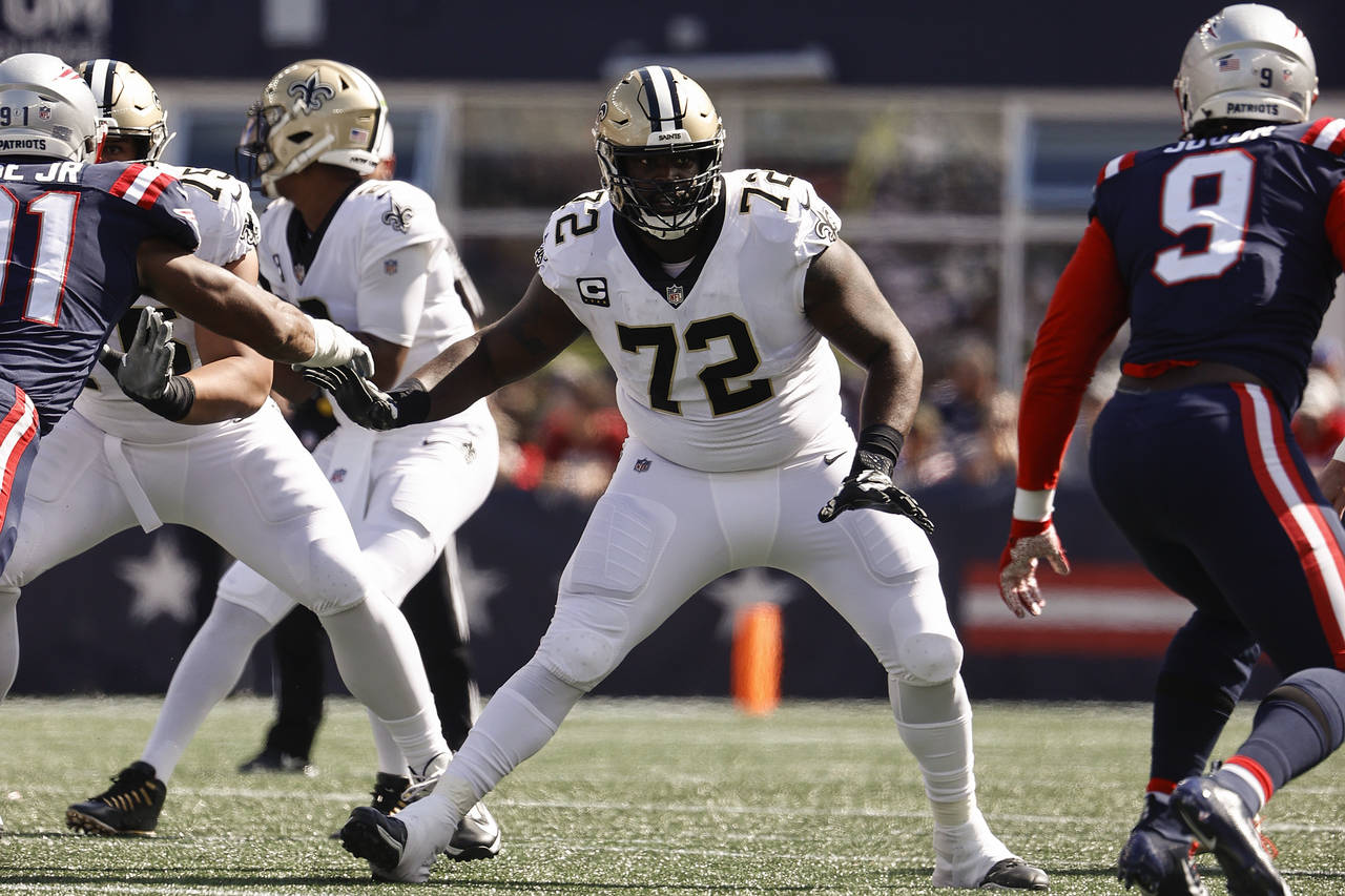 FILE - New Orleans Saints offensive tackle Terron Armstead looks to block against the New England P...