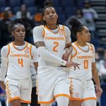 
              Tennessee's Alexus Dye (2), Jordan Walker (4) and Brooklynn Miles (0) walk down the court in the closing moments of their loss to Kentucky in the second half of an NCAA college basketball semifinal round game at the women's Southeastern Conference tournament Saturday, March 5, 2022, in Nashville, Tenn. Kentucky won 83-74. (AP Photo/Mark Humphrey)
            