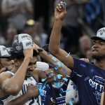
              Villanova forward Jermaine Samuels celebrates with teammates after their win against Houston during a college basketball game in the Elite Eight round of the NCAA tournament on Saturday, March 26, 2022, in San Antonio. (AP Photo/David J. Phillip)
            