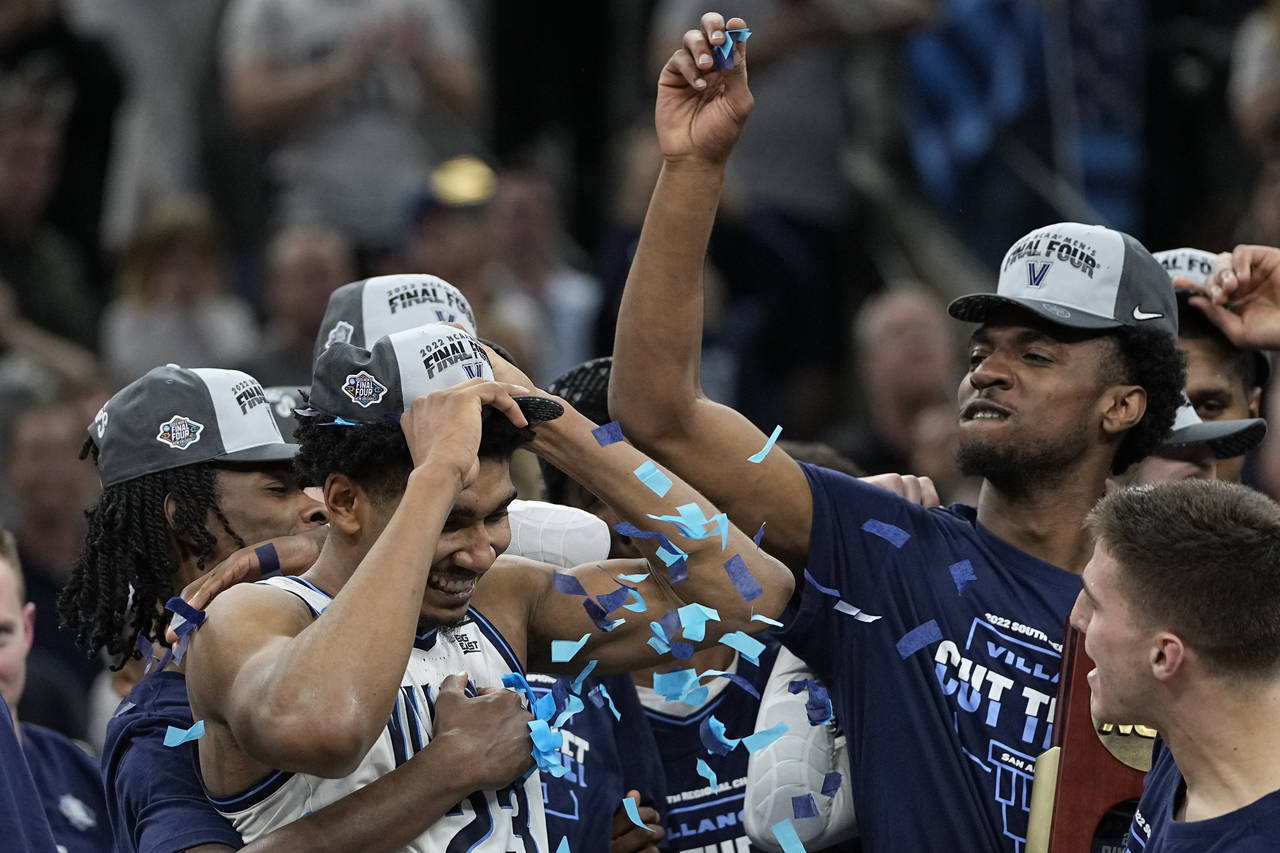 Villanova forward Jermaine Samuels celebrates with teammates after their win against Houston during...
