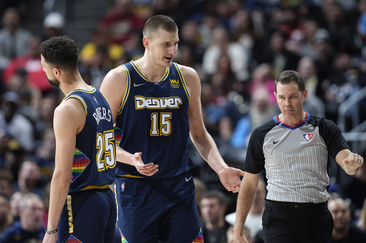 Denver Nuggets center Nikola Jokic argues for a call with referee Brian Forte during the first half...