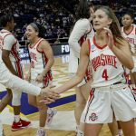 
              Ohio State guard Kateri Poole, left, and Ohio State guard Jacy Sheldon (4) right, celebrate as their team defeats Missouri State 63-56 in a women's college basketball game in the first round of the NCAA tournament, Saturday, March 19, 2022, in Baton Rouge, La. (AP Photo/Matthew Hinton)
            