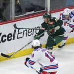 
              Minnesota Wild defenseman Jared Spurgeon (46) passes under pressure from New York Rangers center Ryan Strome (16) and left wing Artemi Panarin (10) during the first period of an NHL hockey game Tuesday, March 8, 2022, in St. Paul, Minn. (AP Photo/Andy Clayton-King)
            